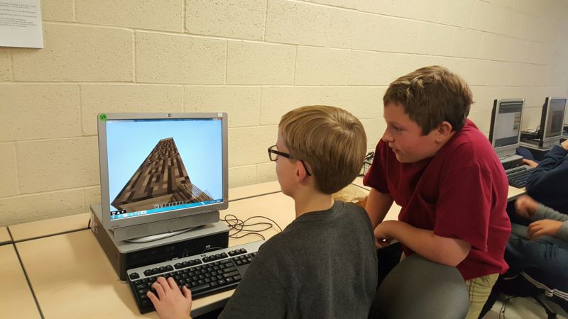 Students learning with Minecraft for Education.